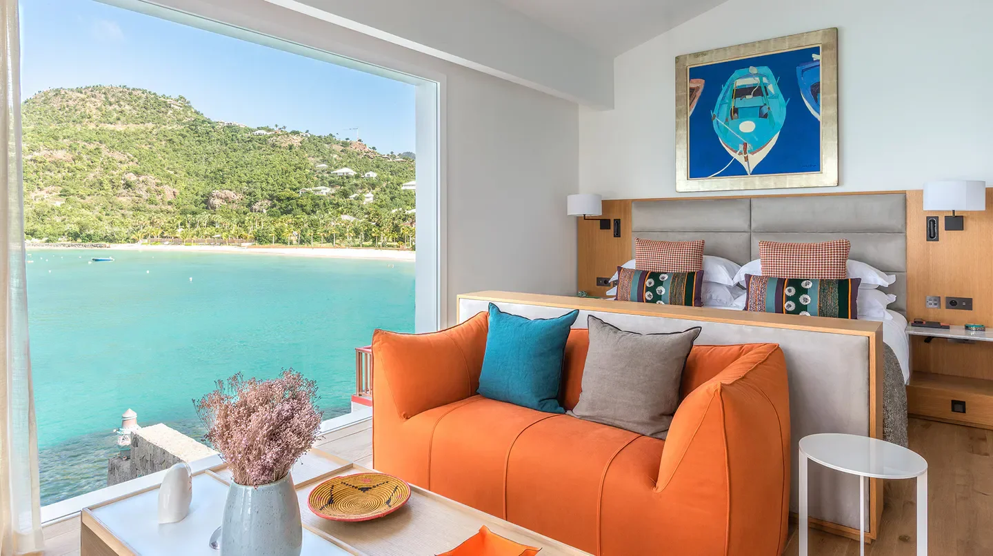 Bright bedroom view at Eden Rock - St Barths, overlooking the turquoise waters of St. Barts