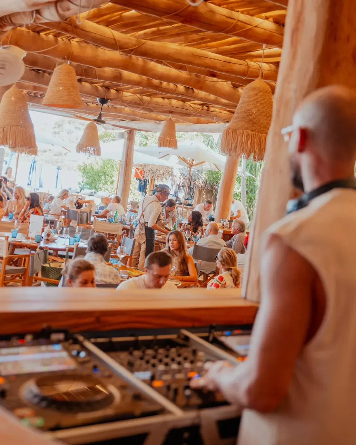 DJ set at Gyp Sea Beach restaurant in St. Barts, with dining area in background.